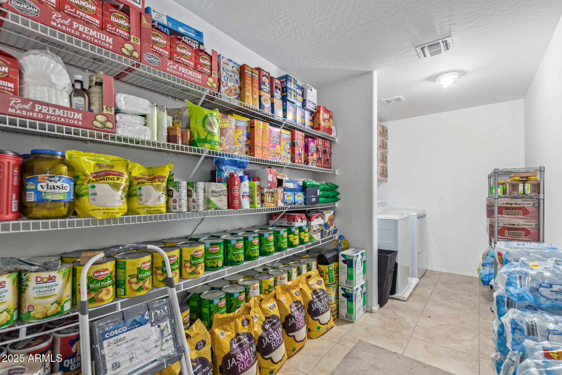 3209 West Apollo Road Phoenix, AZ 85041 - Photo 32 of 40 a room with lots of different kinds of flowers