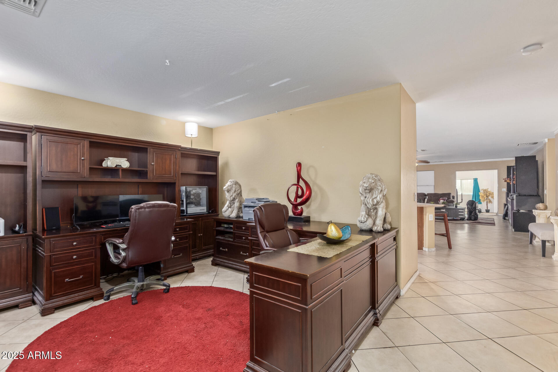 3209 West Apollo Road Phoenix, AZ 85041 - Photo 4 of 40 a room with furniture and gym equipment