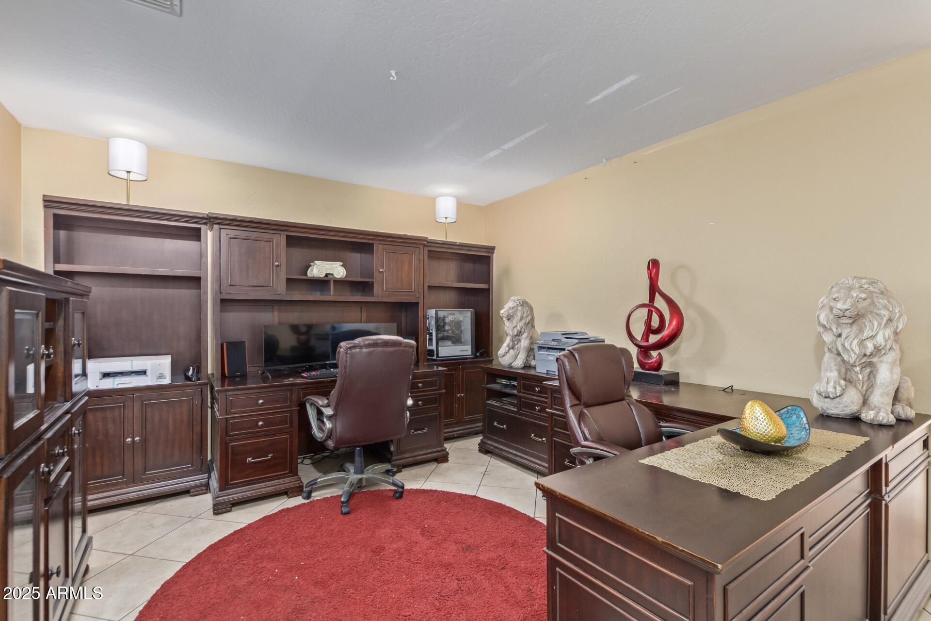 3209 West Apollo Road Phoenix, AZ 85041 - Photo 5 of 40 a view of a workspace with furniture