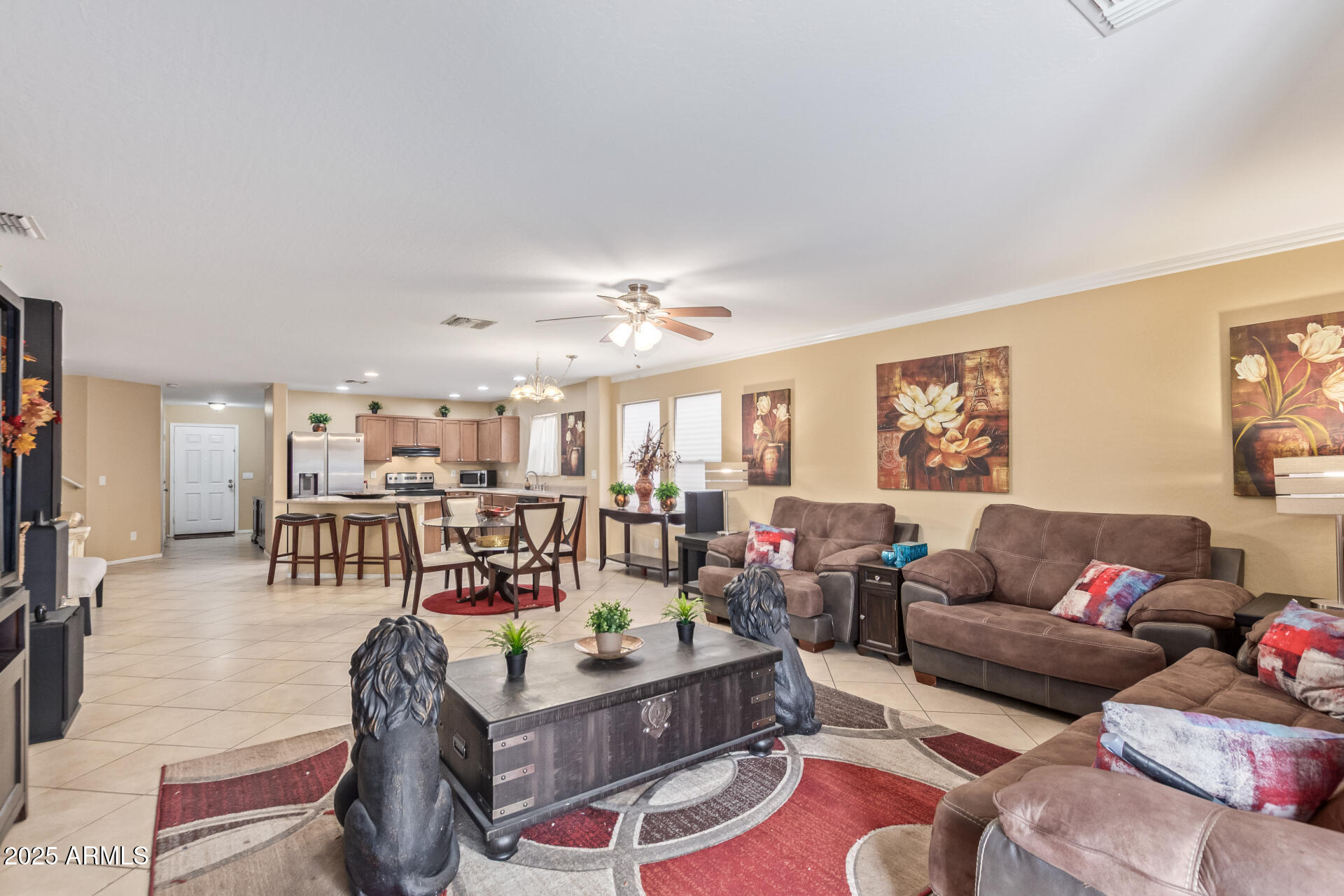 3209 West Apollo Road Phoenix, AZ 85041 - Photo 9 of 40 a living room with furniture and a large window