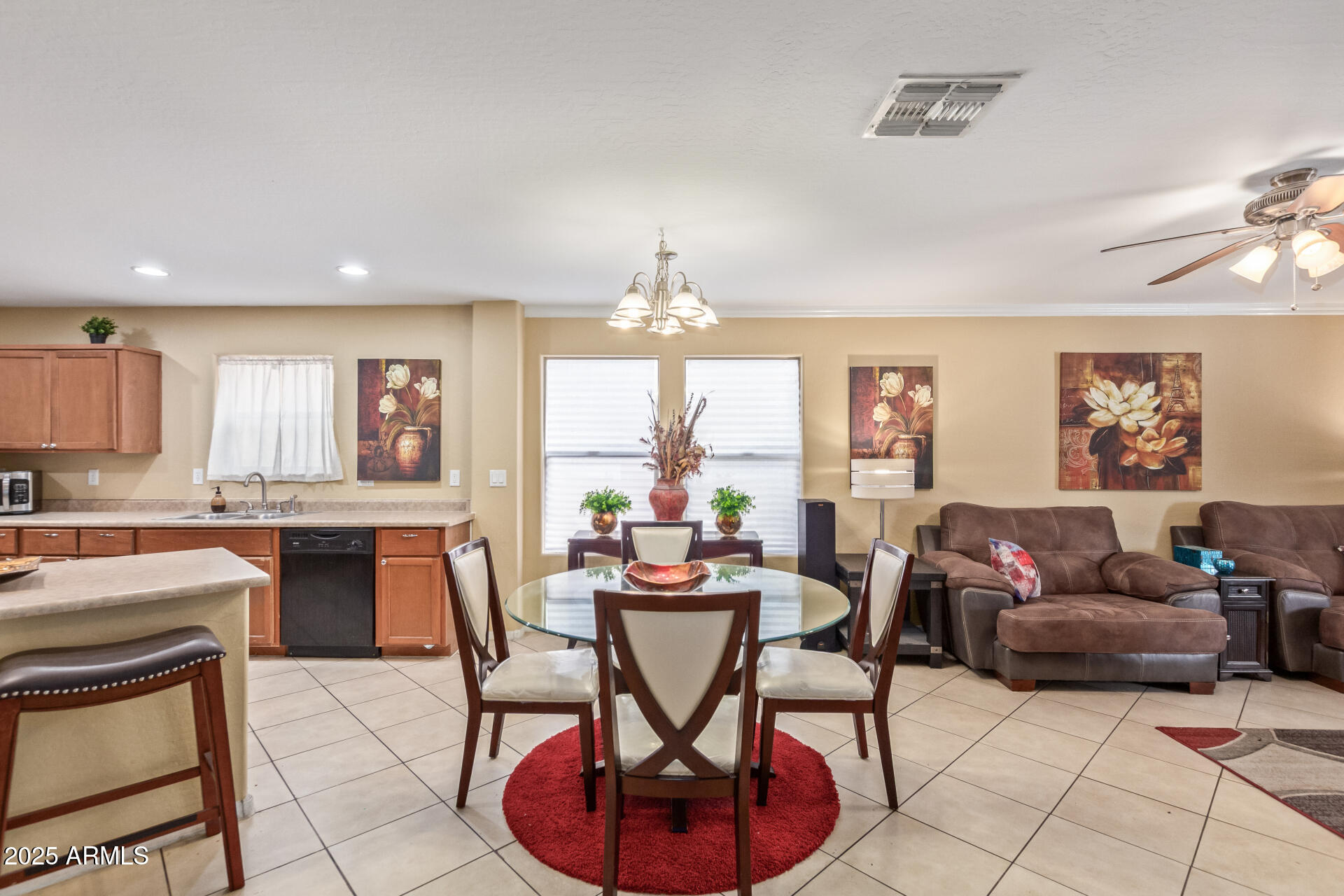 3209 West Apollo Road Phoenix, AZ 85041 - Photo 10 of 40 a view of a dining room with furniture window and outside view