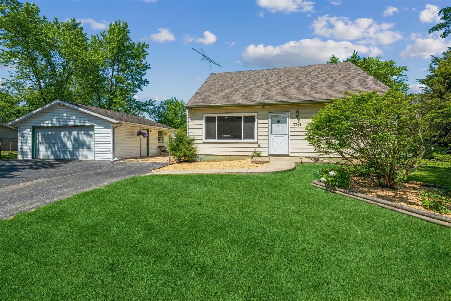 710 Heritage Road Valparaiso, IN 46385 - Photo 1 of 27 a front view of house with yard and green space