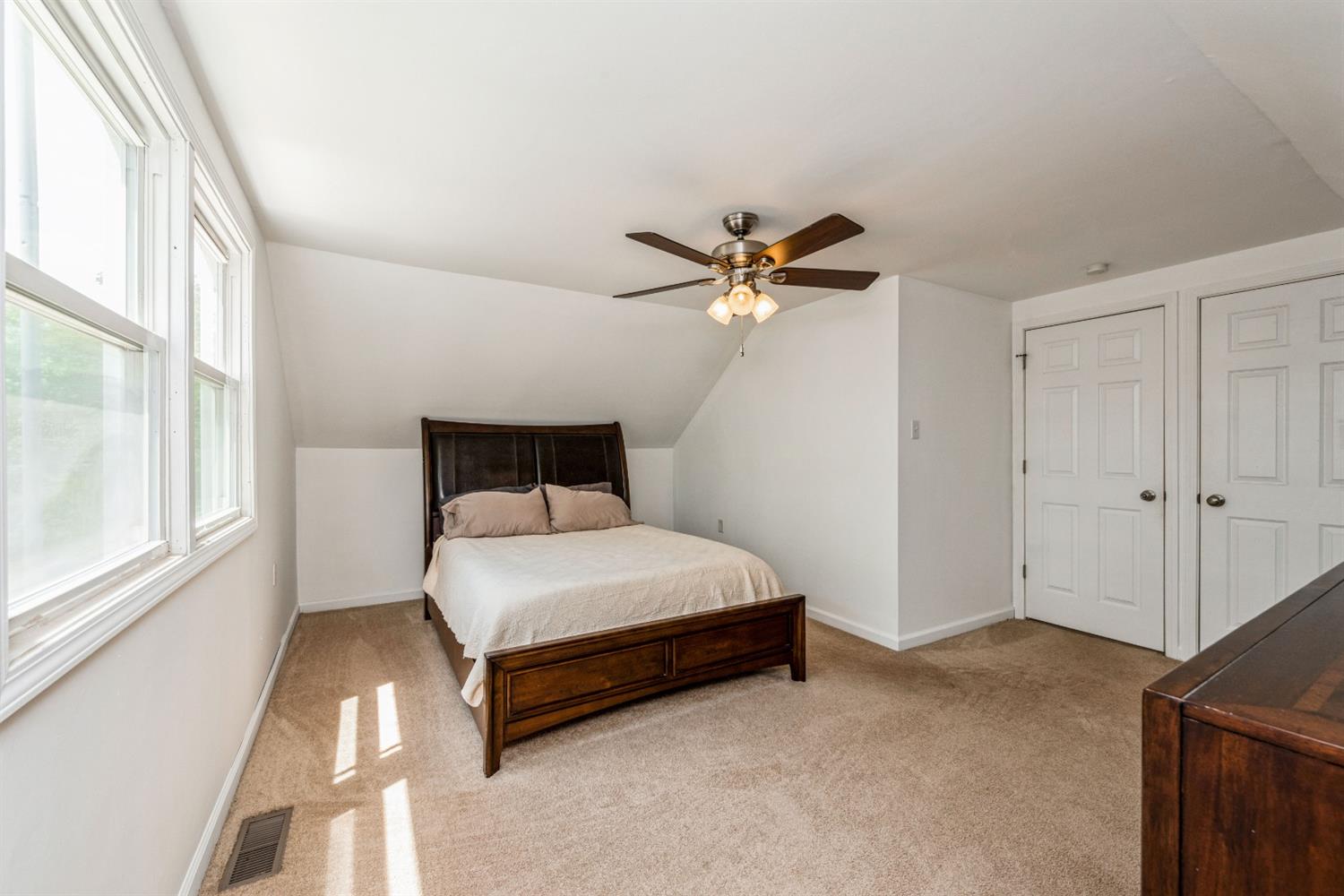 710 Heritage Road Valparaiso, IN 46385 - Photo 12 of 27 a bedroom with a bed and window