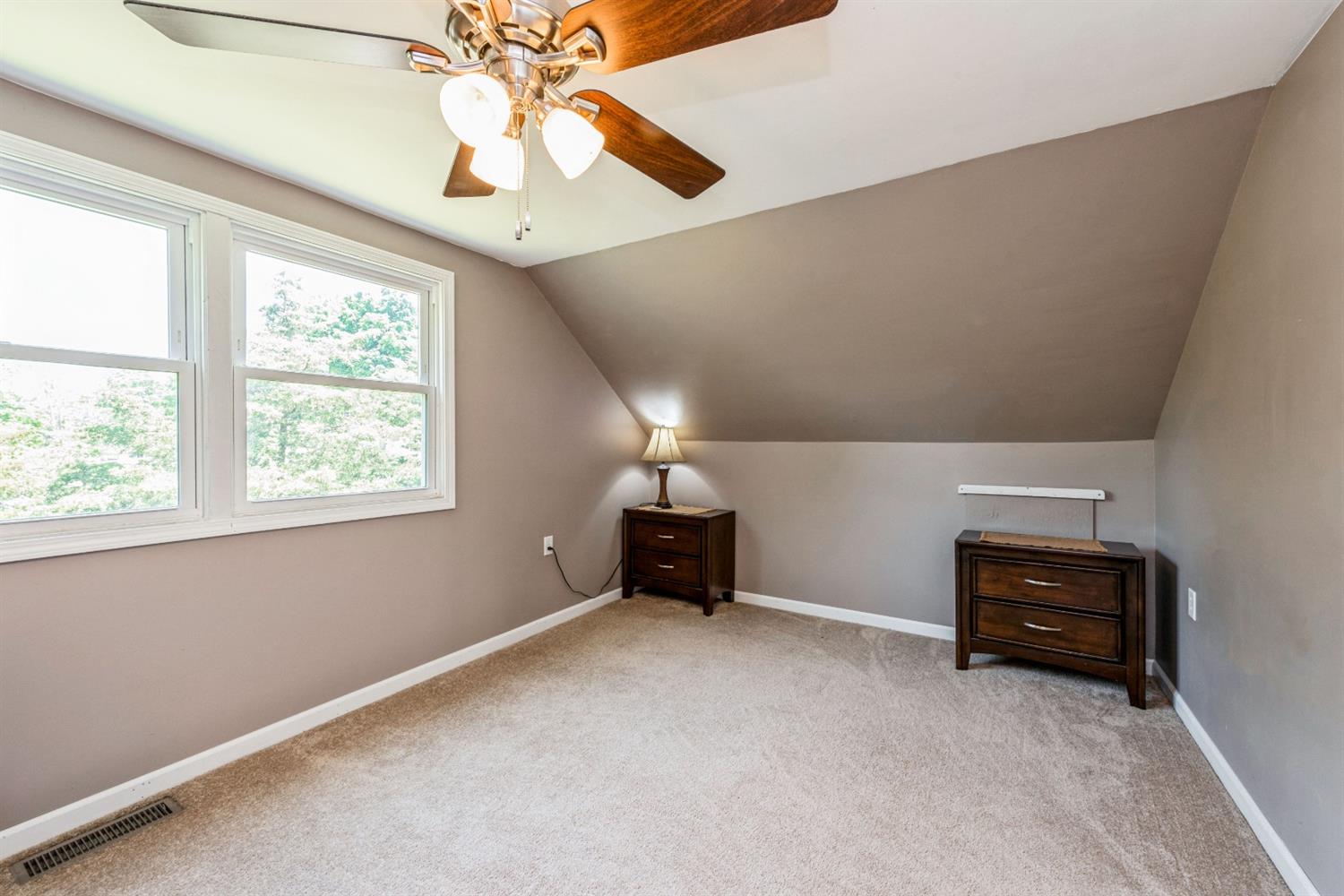 710 Heritage Road Valparaiso, IN 46385 - Photo 15 of 27 a living room with furniture and a chandelier