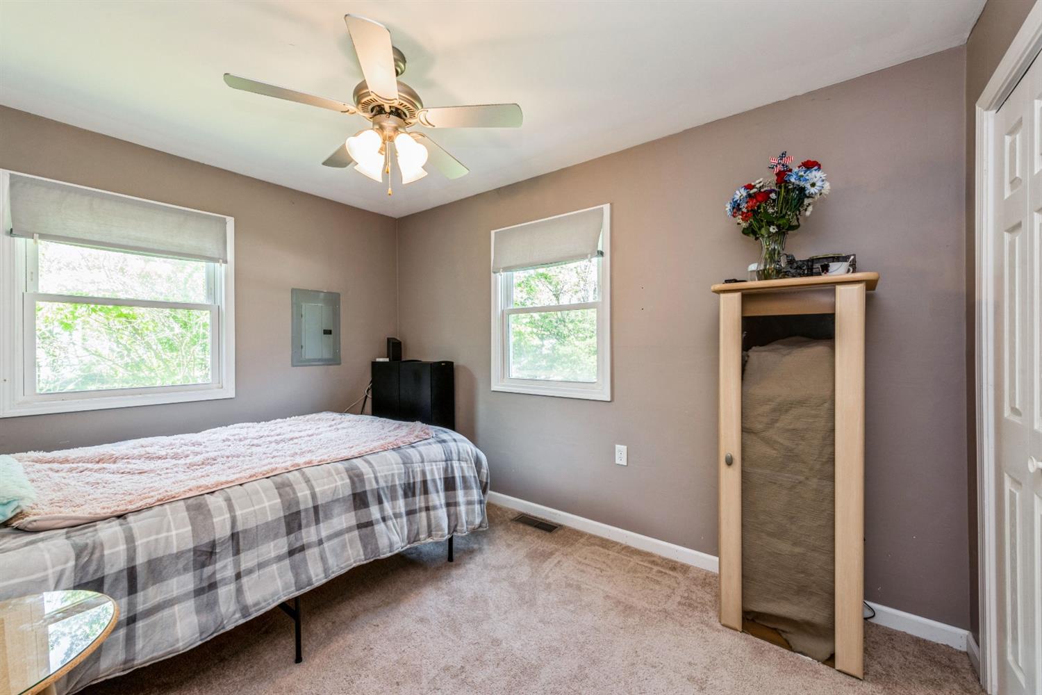 710 Heritage Road Valparaiso, IN 46385 - Photo 20 of 27 a bedroom with a bed and a chandelier