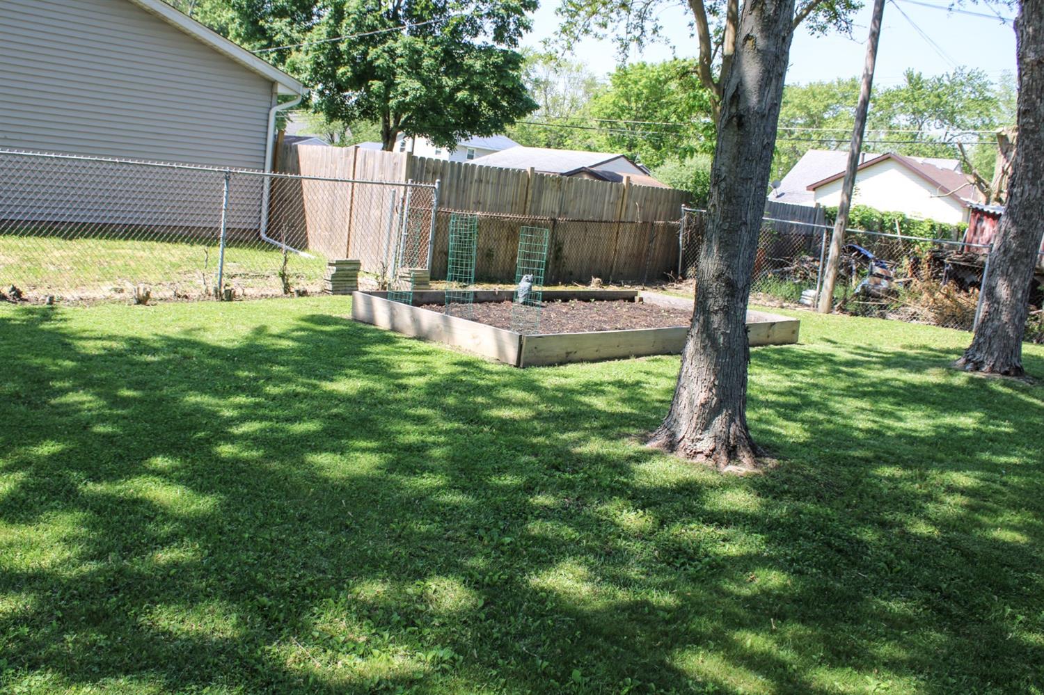 710 Heritage Road Valparaiso, IN 46385 - Photo 23 of 27 a view of a garden with a tree