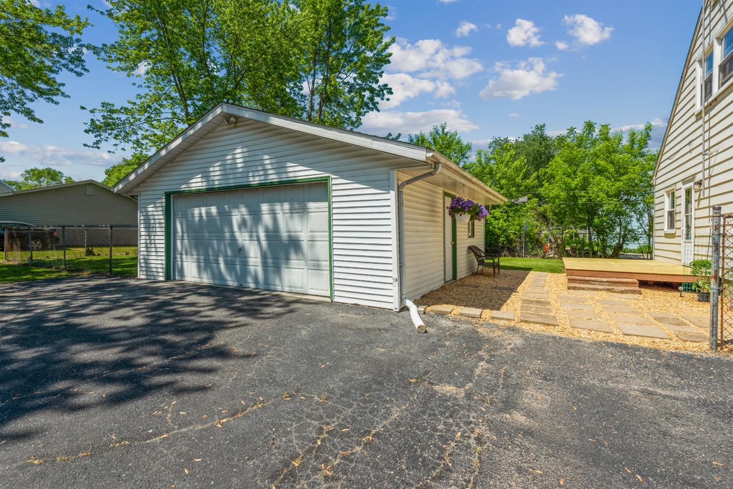 710 Heritage Road Valparaiso, IN 46385 - Photo 24 of 27 a view of a house with a yard and garage