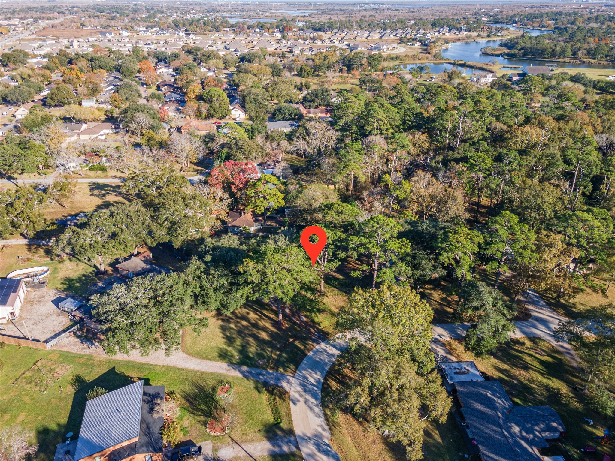 5059 Winding Way Dickinson, TX 77539 - Photo 3 of 13 an aerial view of residential houses with outdoor space