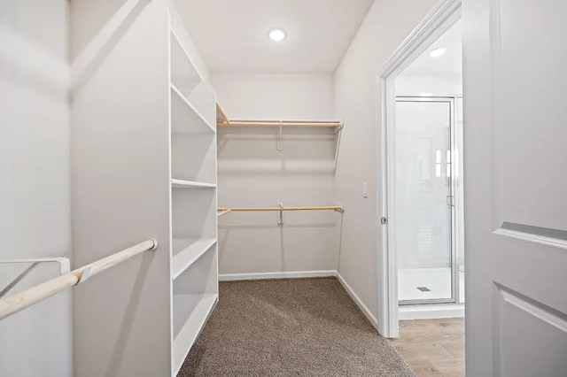 a view of an empty walk in closet