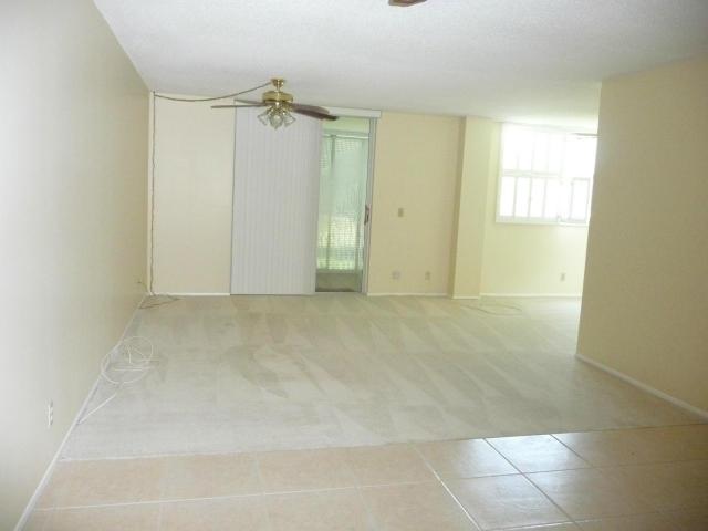 5961 Northwest 2nd Avenue, Unit 207 Boca Raton, FL 33487 - Photo 7 of 9 living and dining