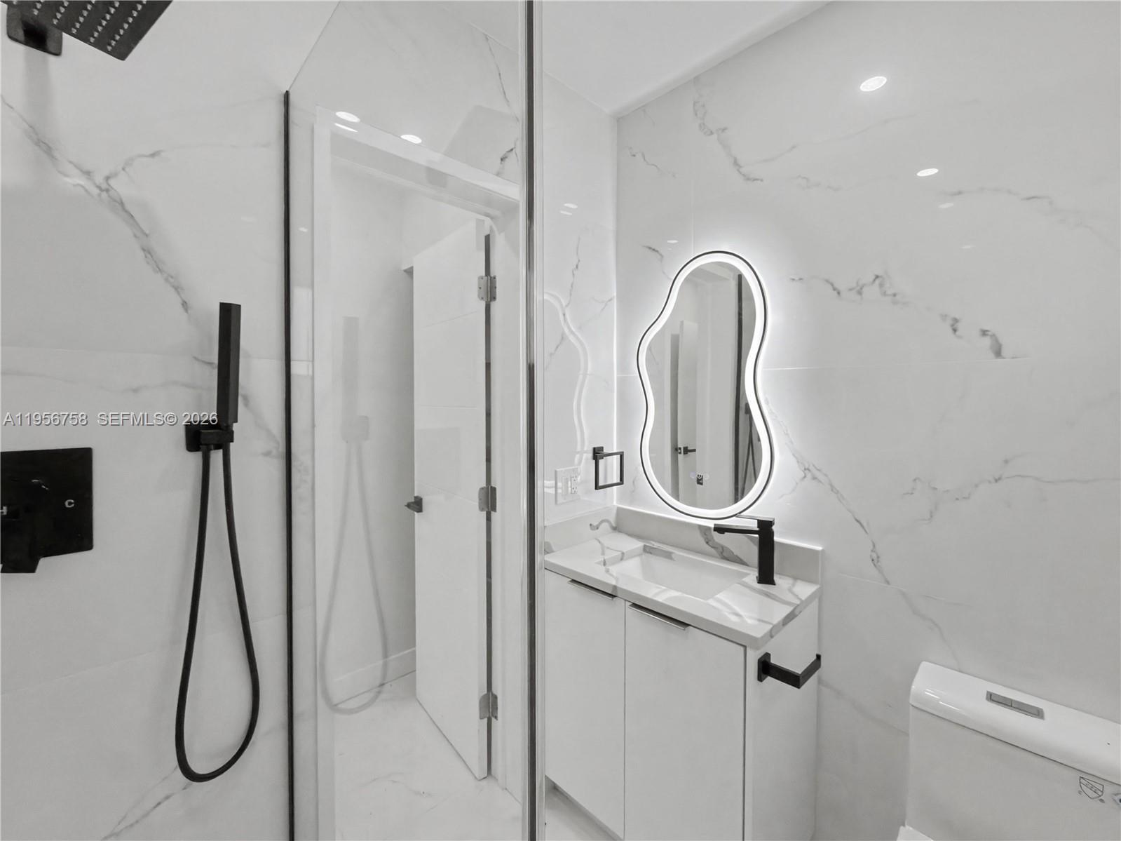 2490 Southwest 17th Street Miami, FL 33145 - Photo 17 of 36 a bathroom with a shower