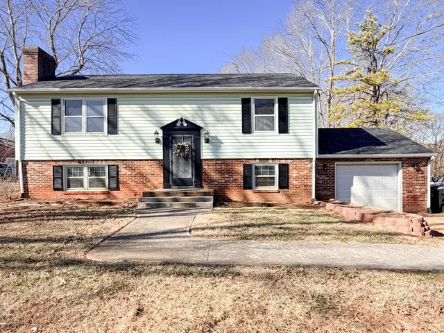 a view of a house with snow on the wall