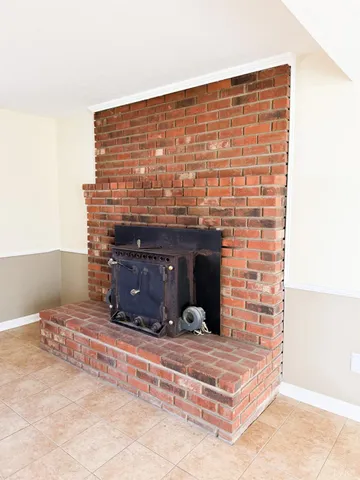 a living room with a fireplace