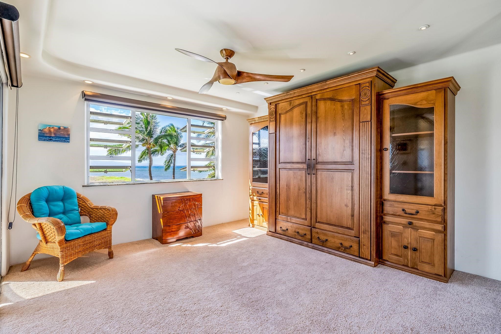 760 South Kihei Road, Unit 522 Kihei, HI 96753 - Photo 14 of 48 a bedroom with furniture and a window