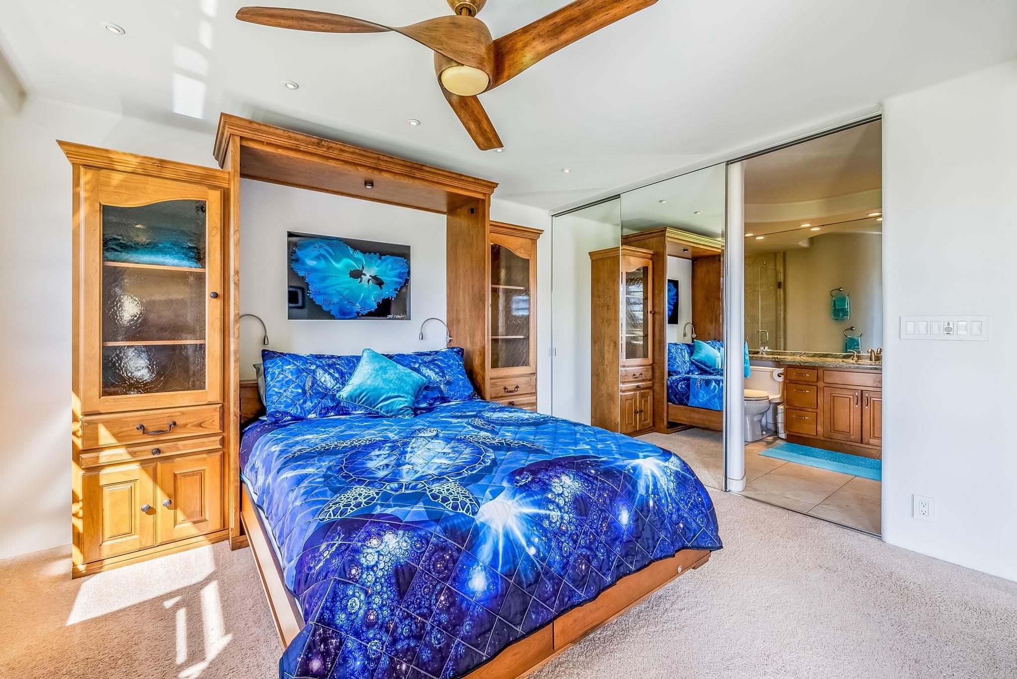 760 South Kihei Road, Unit 522 Kihei, HI 96753 - Photo 16 of 48 a large bed sitting in a bedroom next to a window