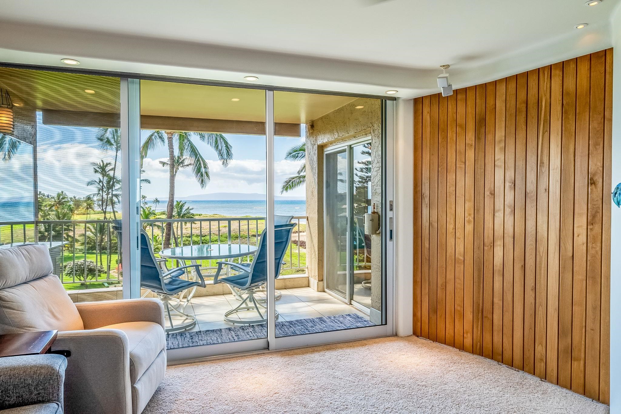 760 South Kihei Road, Unit 522 Kihei, HI 96753 - Photo 17 of 48 a bedroom with furniture and large windows