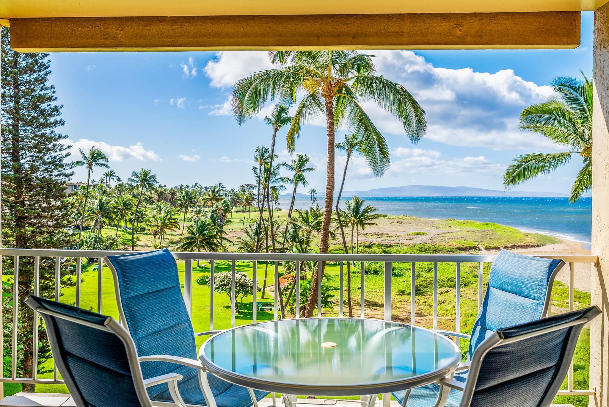760 South Kihei Road, Unit 522 Kihei, HI 96753 - Photo 2 of 48 a view of a dining room with furniture window and wooden floor