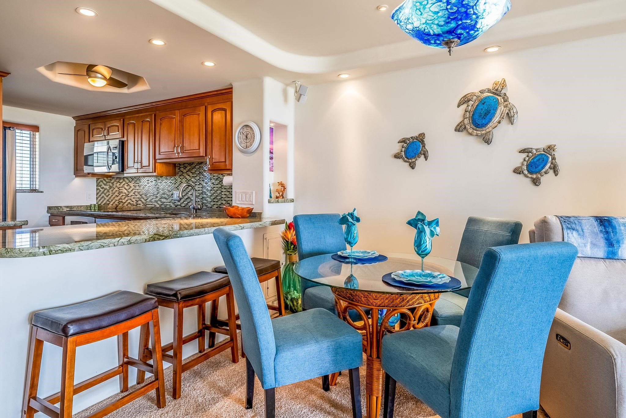 760 South Kihei Road, Unit 522 Kihei, HI 96753 - Photo 26 of 48 a dining room with furniture and window