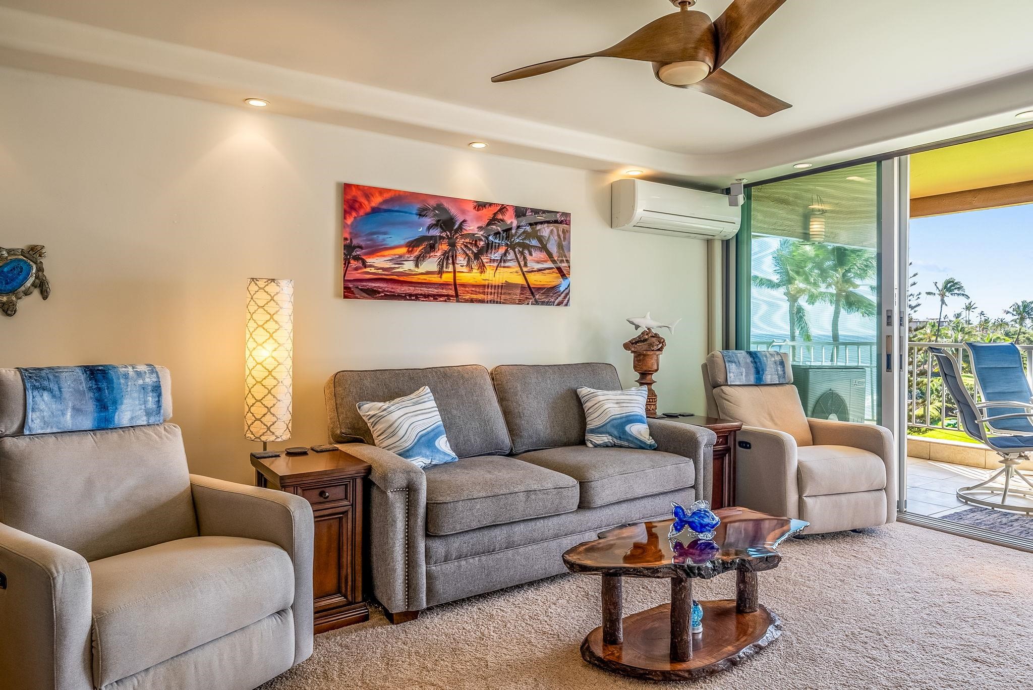 760 South Kihei Road, Unit 522 Kihei, HI 96753 - Photo 29 of 48 a living room with furniture and a large window