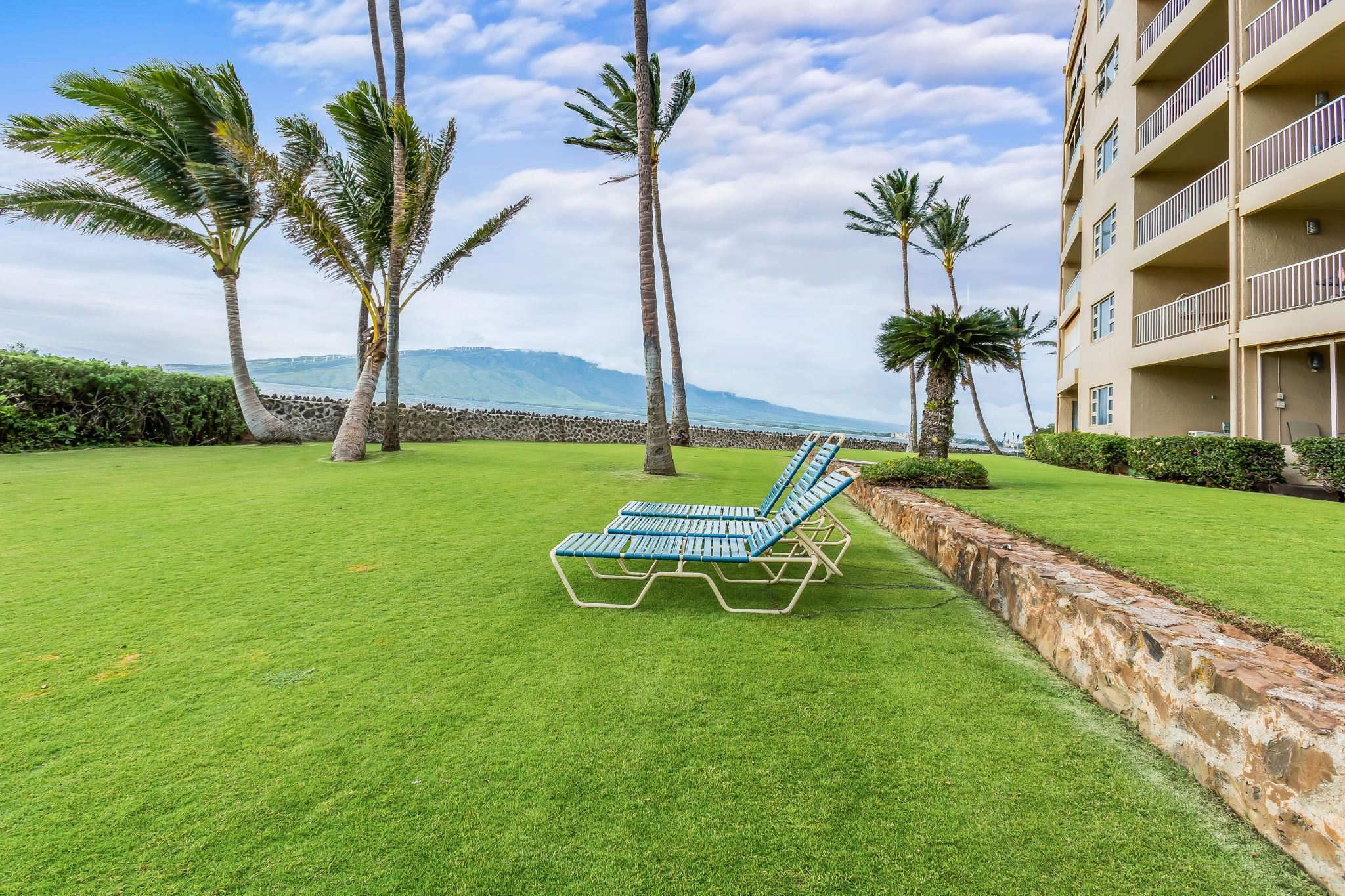 760 South Kihei Road, Unit 522 Kihei, HI 96753 - Photo 31 of 48 a swimming pool with outdoor seating and garden