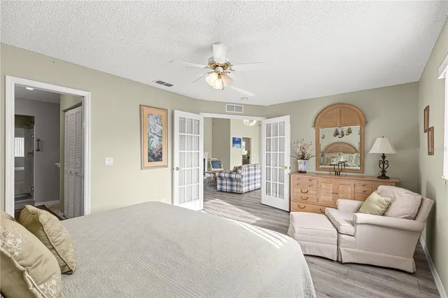 a bathroom with a shower sink and mirror