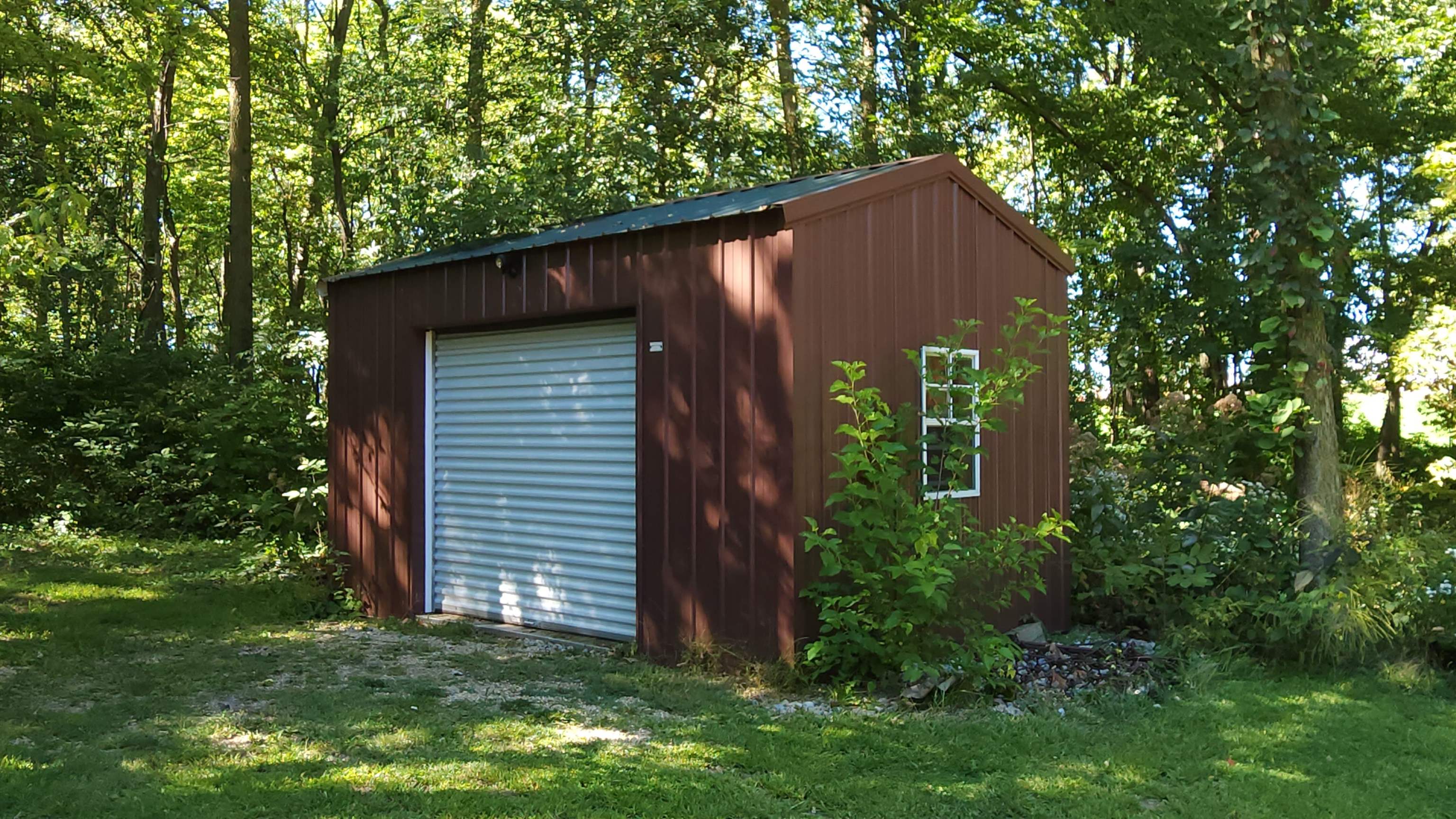 6262 North Eggert Road Rock City, IL 61070 - Photo 12 of 75 a backyard of a house with lots of green space