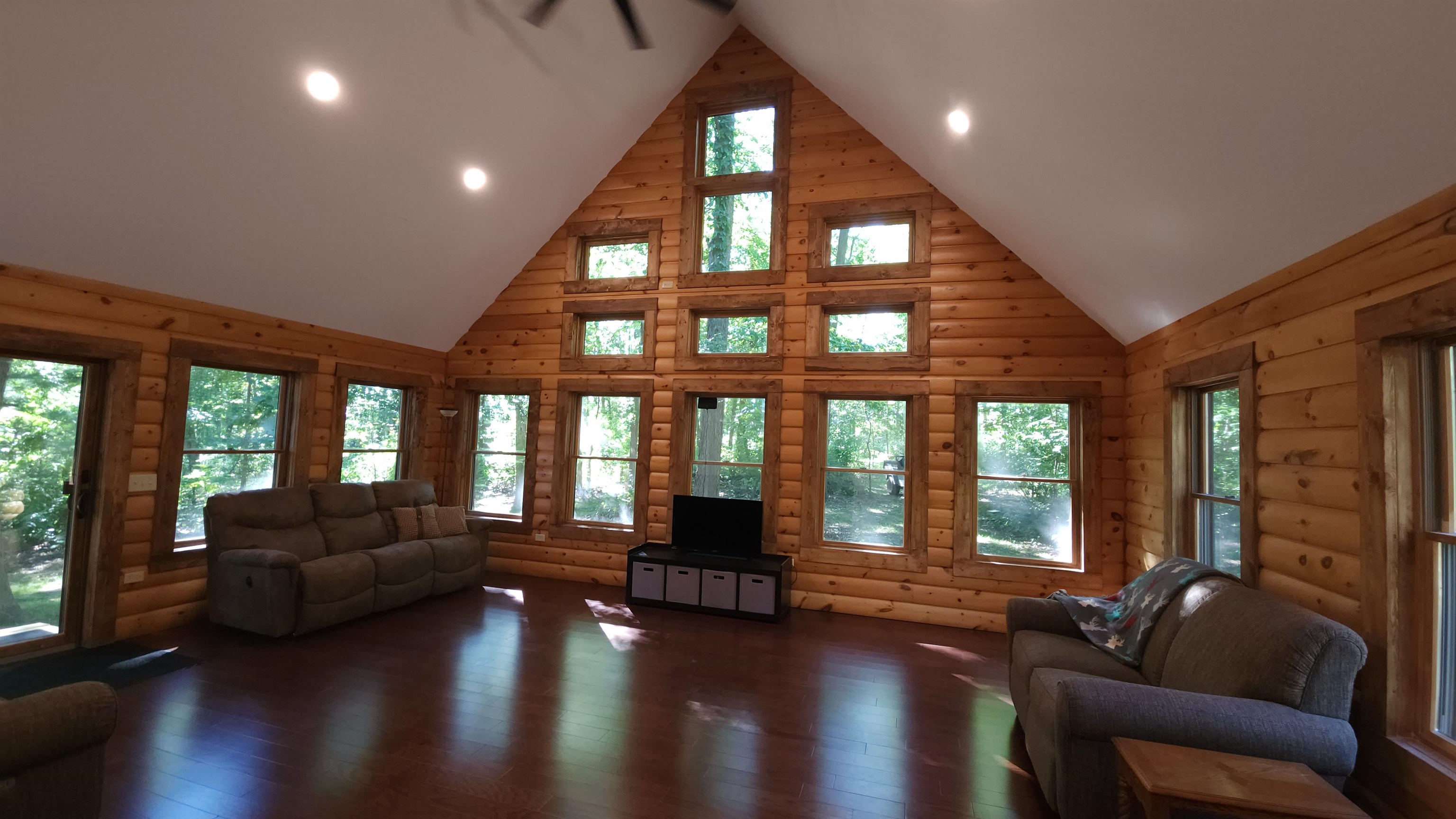 6262 North Eggert Road Rock City, IL 61070 - Photo 21 of 75 a living room with furniture and a large window