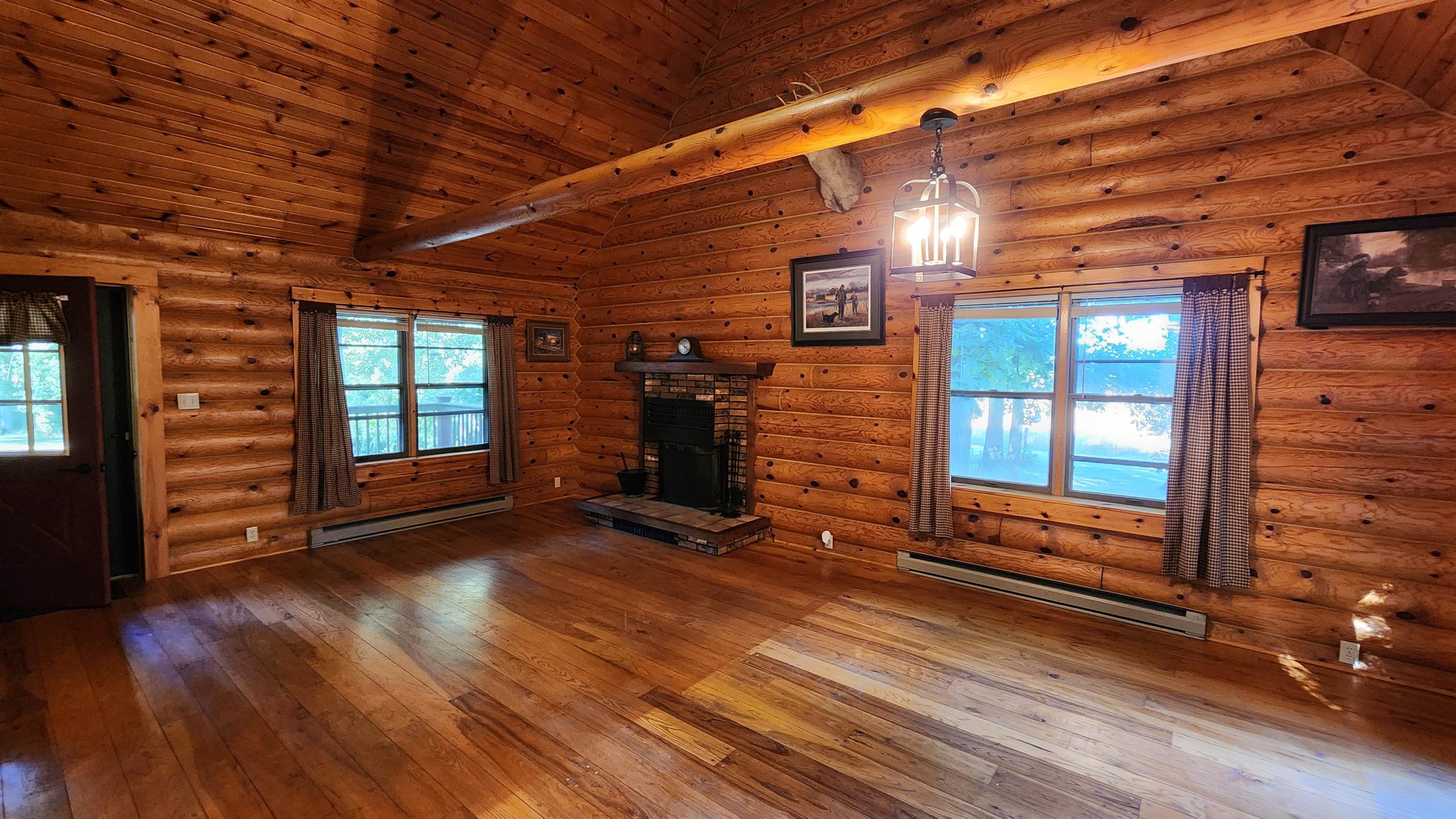 6262 North Eggert Road Rock City, IL 61070 - Photo 26 of 75 a view of an empty room with a fireplace