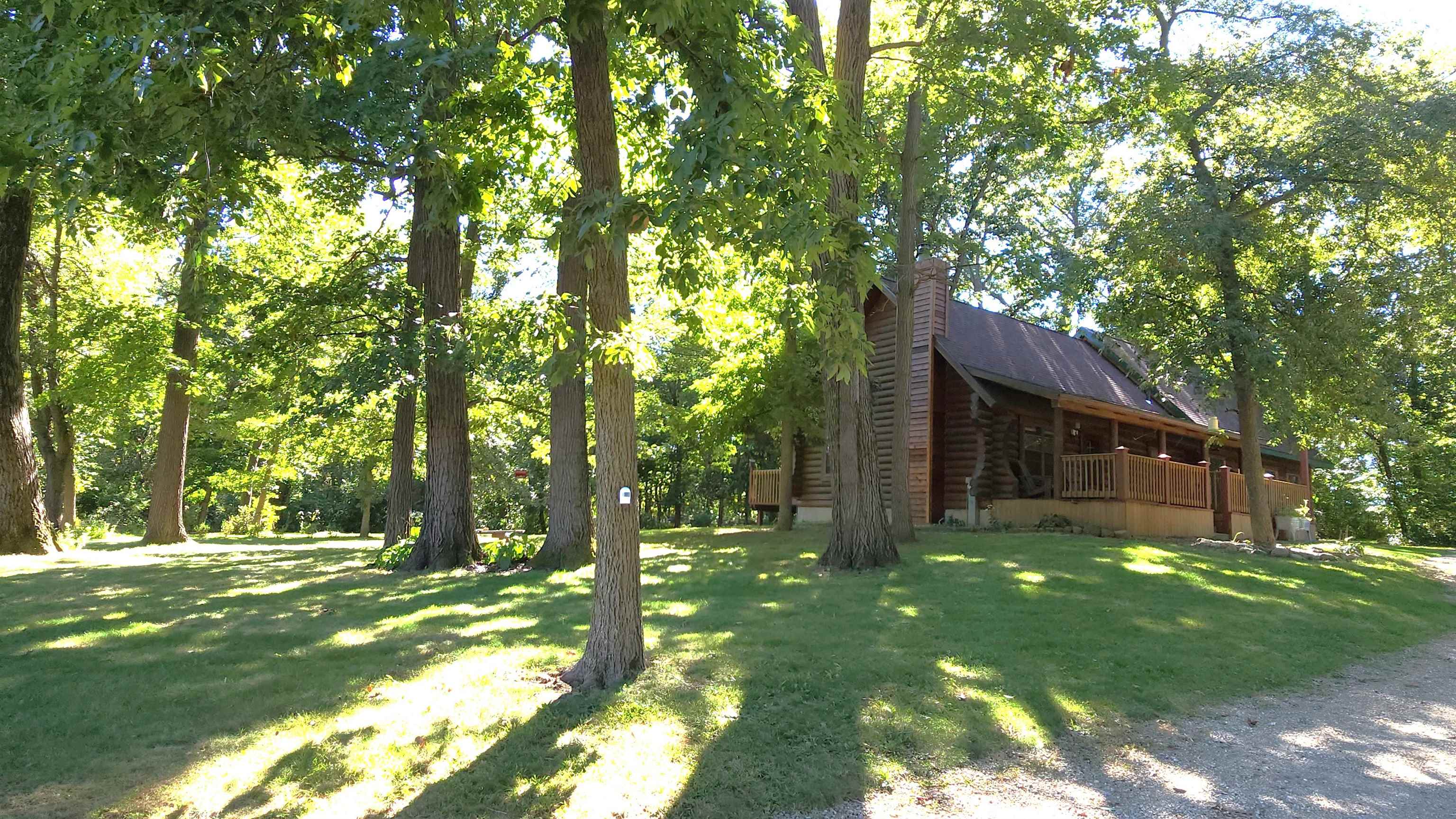 6262 North Eggert Road Rock City, IL 61070 - Photo 3 of 75 a view of a house with a tree