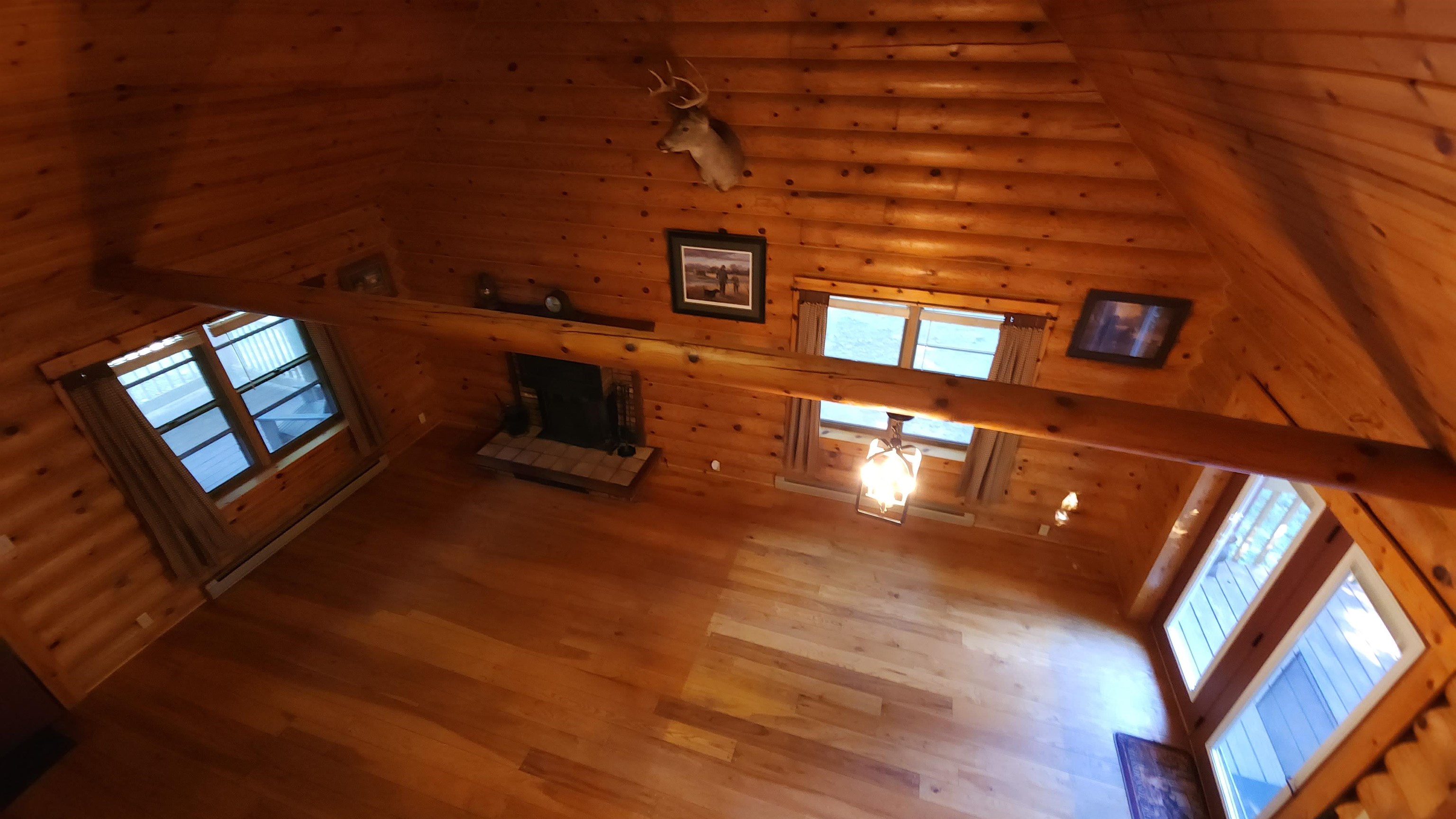 6262 North Eggert Road Rock City, IL 61070 - Photo 50 of 75 a view of a living room and entryway with wooden floor