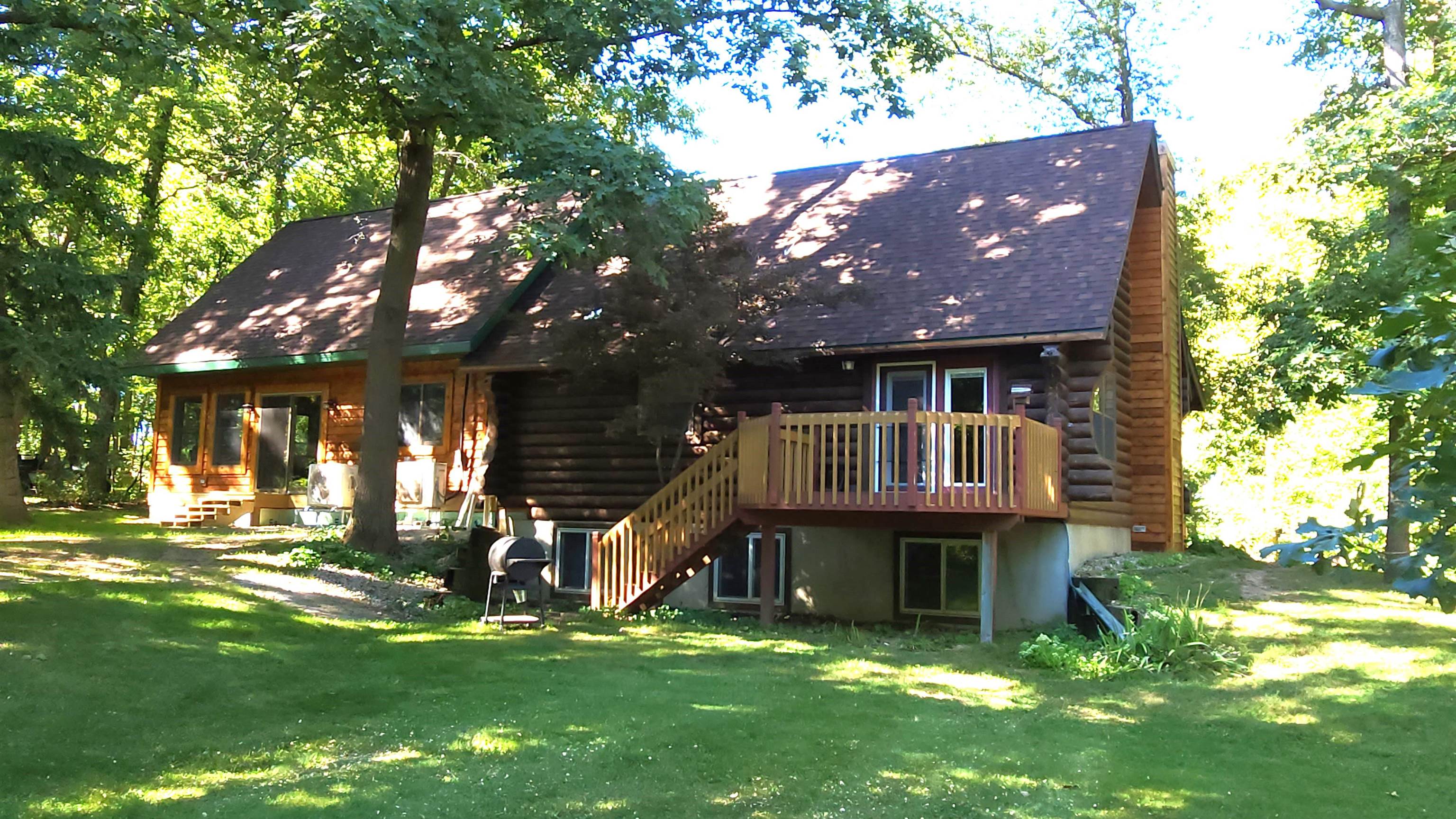 6262 North Eggert Road Rock City, IL 61070 - Photo 5 of 75 a view of a house with a backyard porch and sitting area