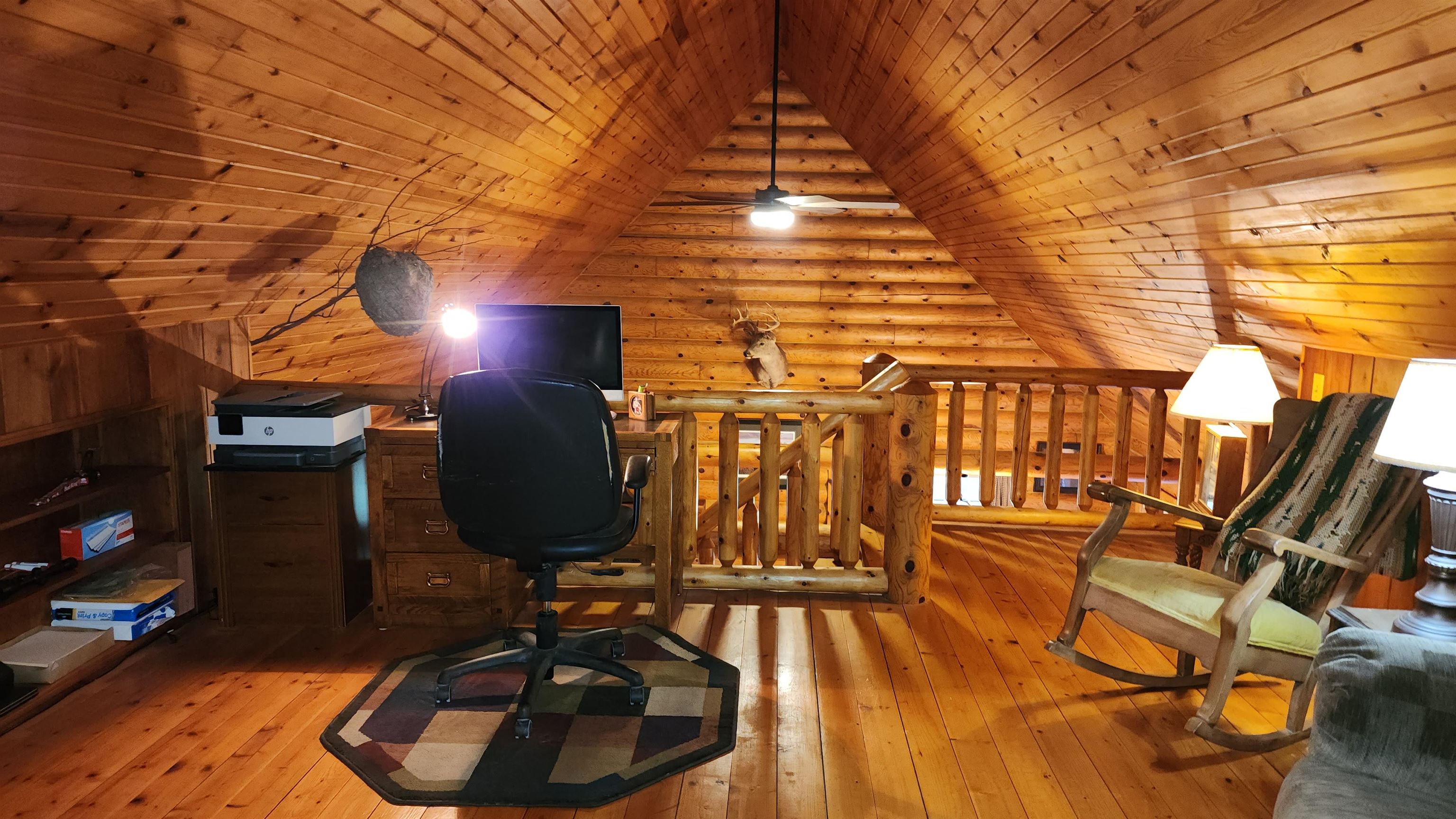 6262 North Eggert Road Rock City, IL 61070 - Photo 52 of 75 a room with wooden floor and furniture