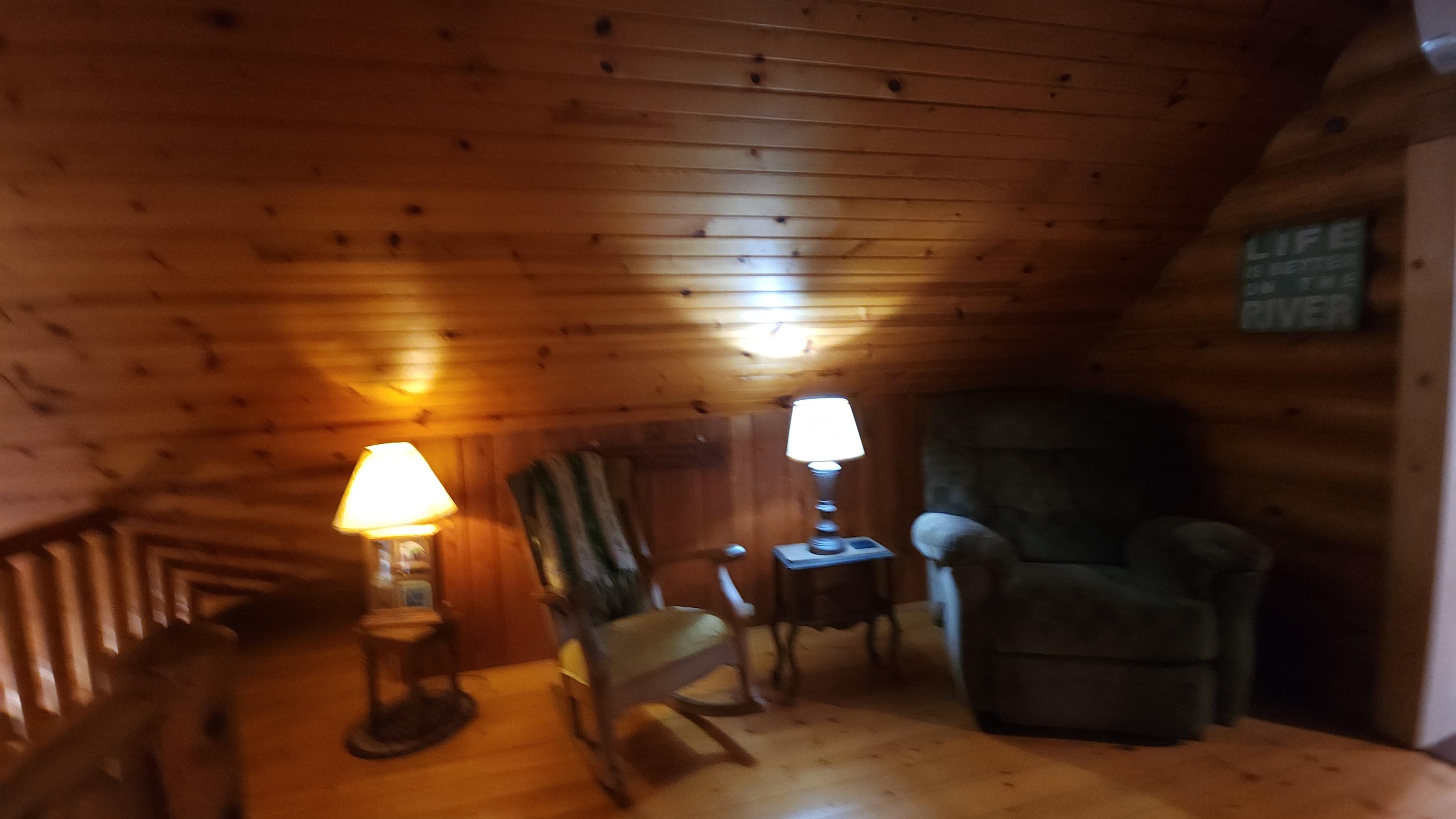 6262 North Eggert Road Rock City, IL 61070 - Photo 53 of 75 a view of a livingroom with furniture and a fireplace