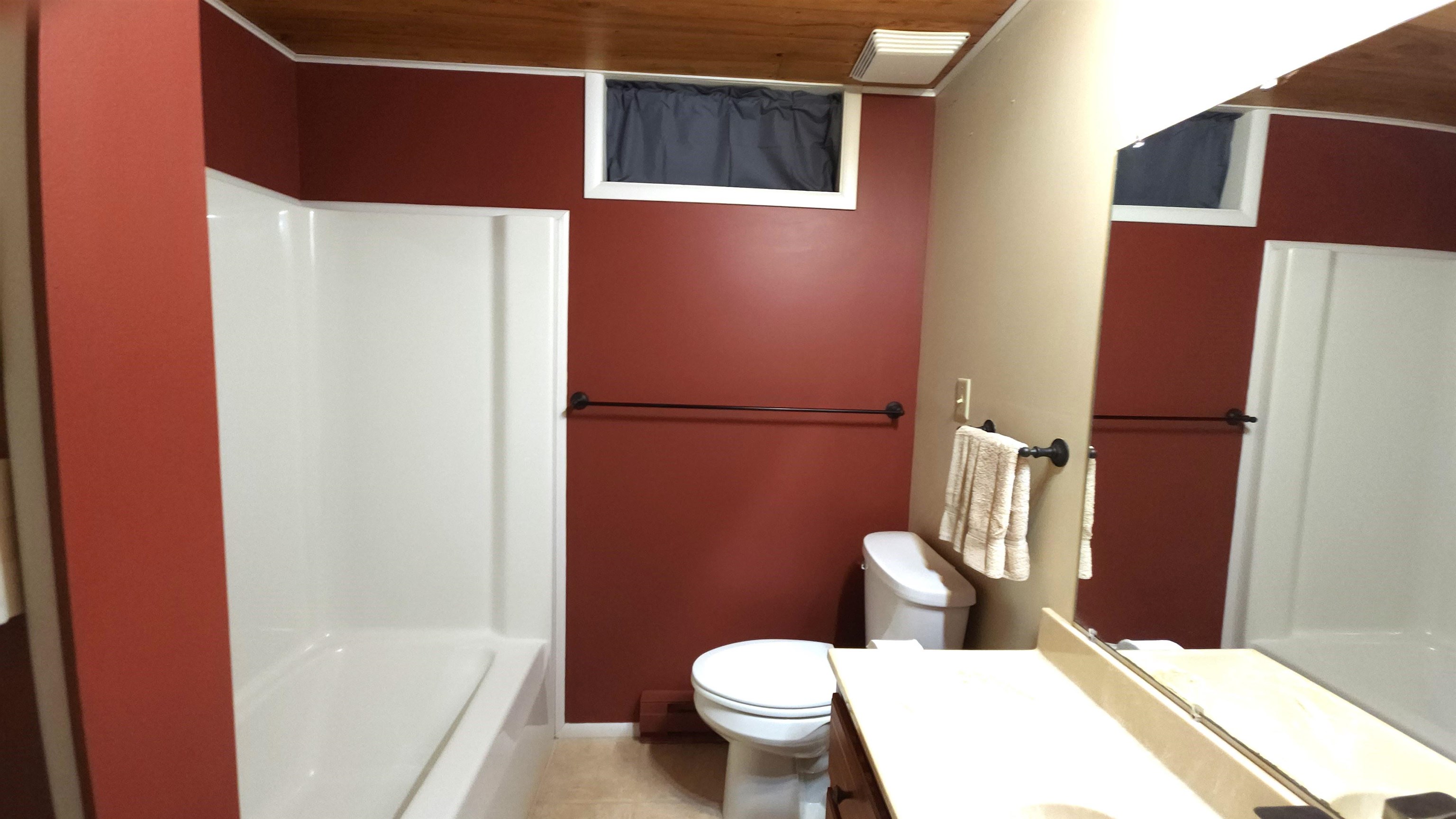 6262 North Eggert Road Rock City, IL 61070 - Photo 61 of 75 a bathroom with a toilet and a shower