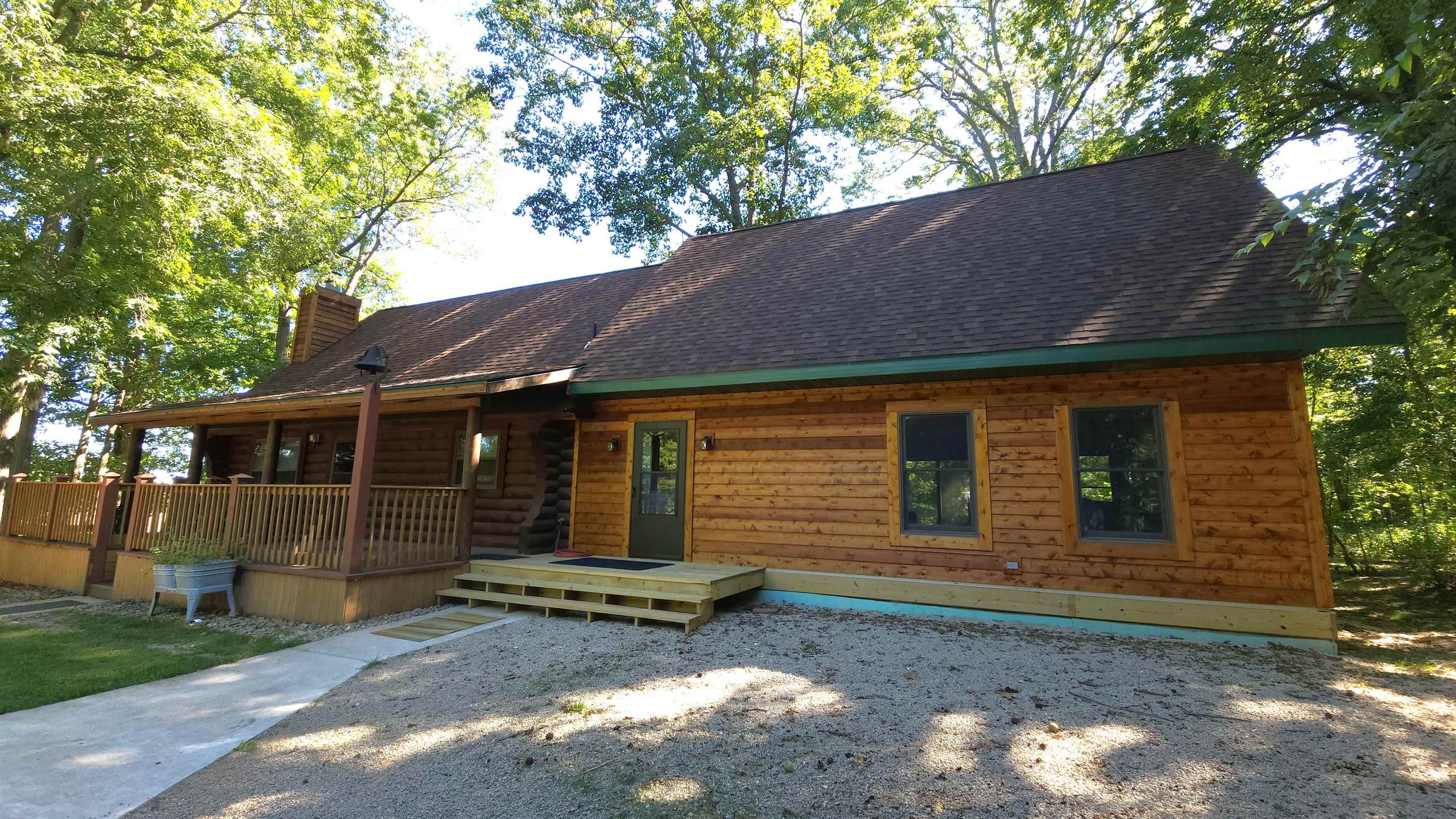 6262 North Eggert Road Rock City, IL 61070 - Photo 75 of 75 a front view of a house with a yard