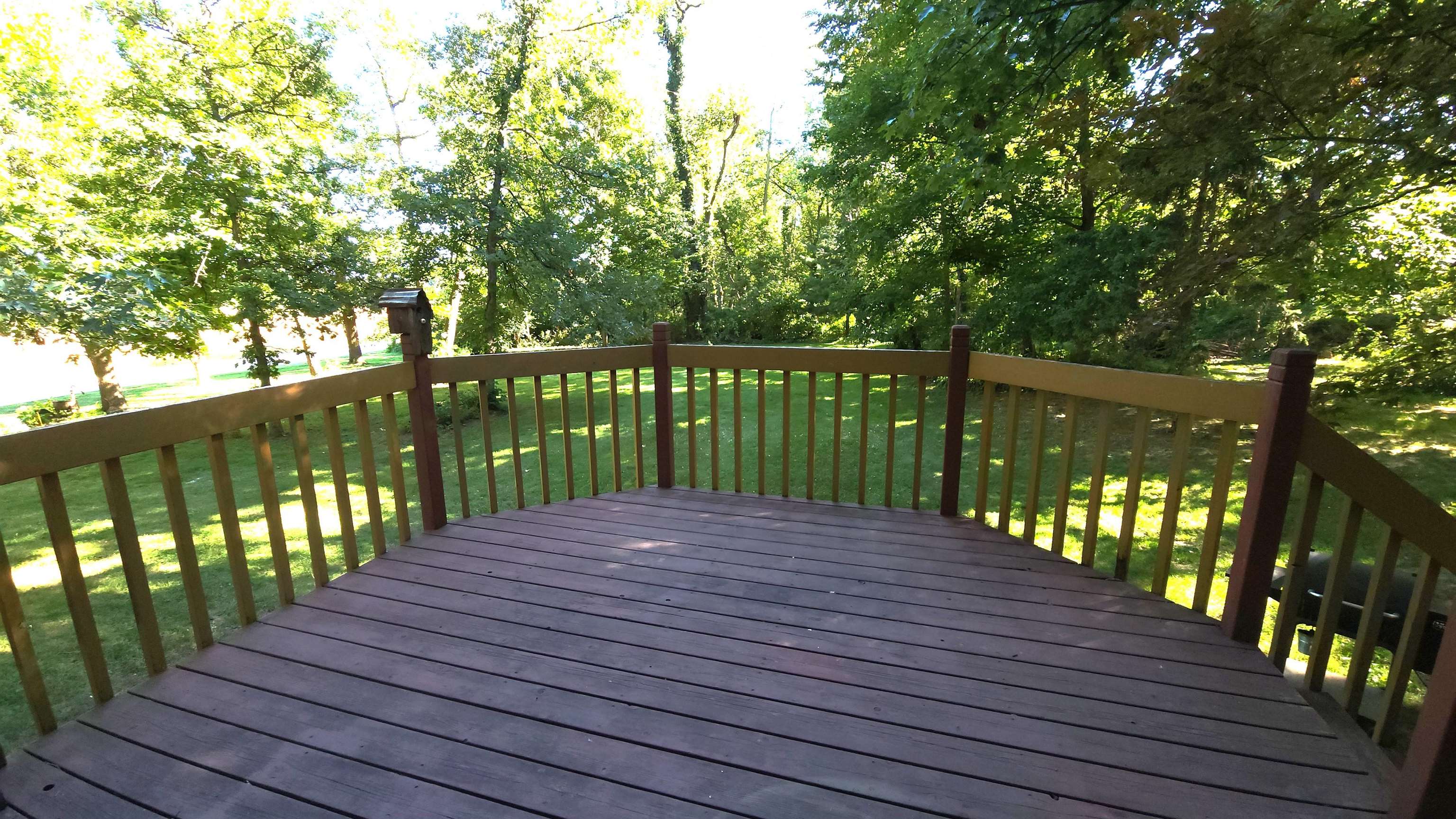 6262 North Eggert Road Rock City, IL 61070 - Photo 10 of 75 a view of deck with wooden floor and fence