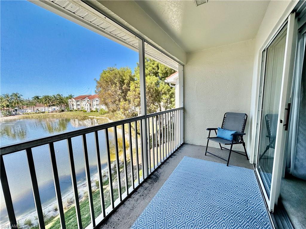 4700 St Croix Lane, Unit 335 Naples, FL 34109 - Photo 14 of 31 a view of a balcony with chairs