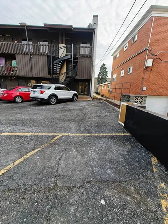 a car parked in front of a building