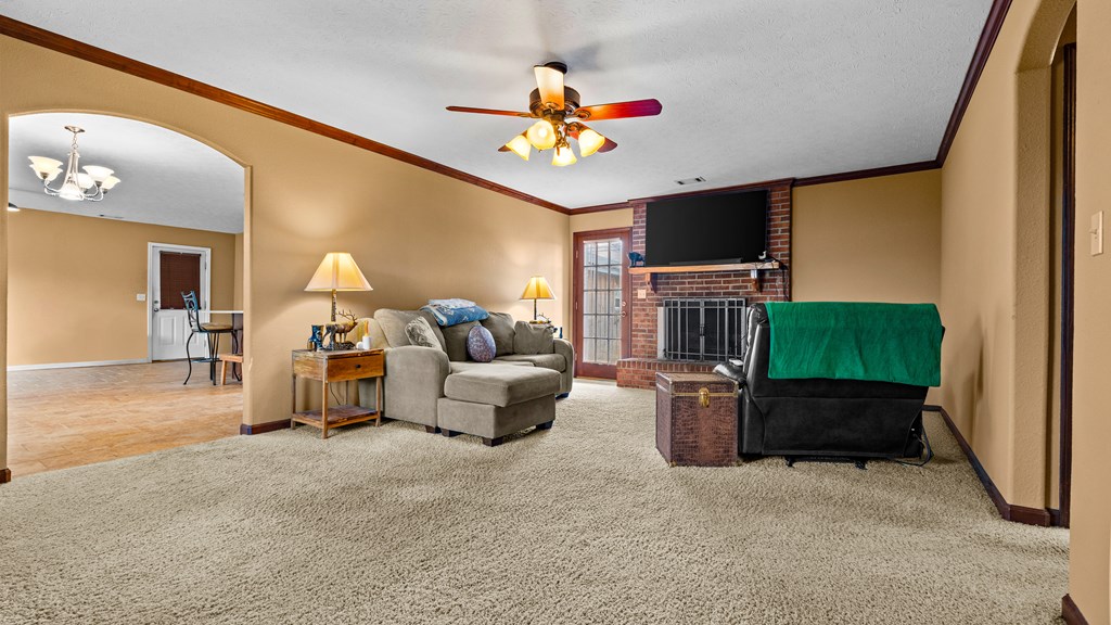 1164 Pineknot Road Box Springs, GA 31801 - Photo 11 of 31 cozy den with fireplace
