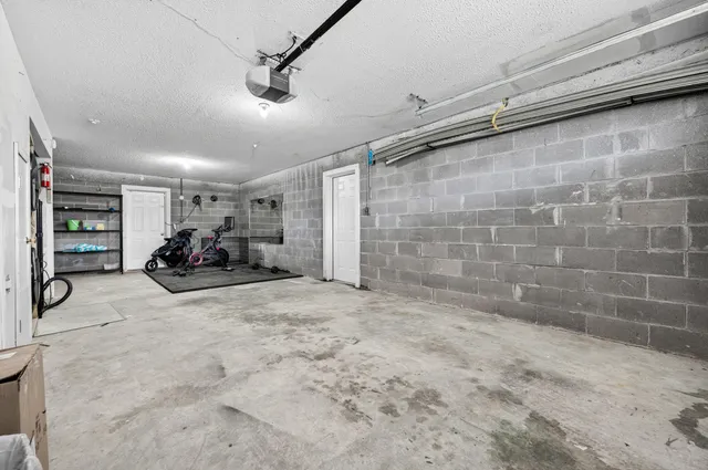 an aerial view of a house with a swimming pool