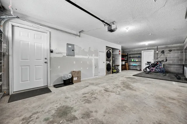 an aerial view of a house with a garden