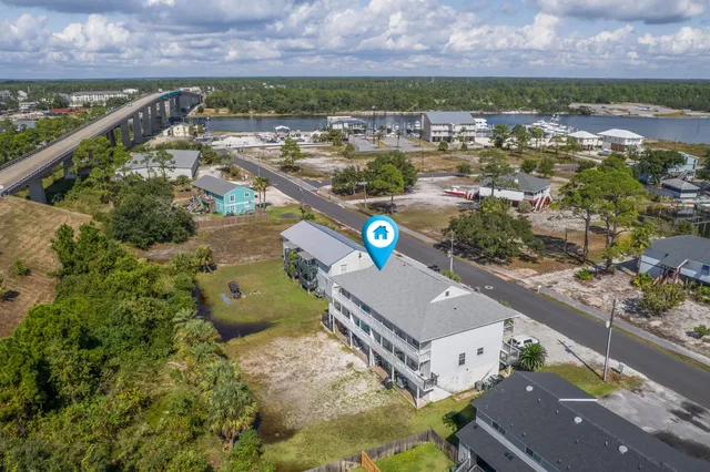 an aerial view of a houses with outdoor space