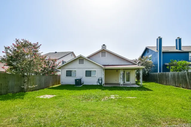 a house with garden in front of it