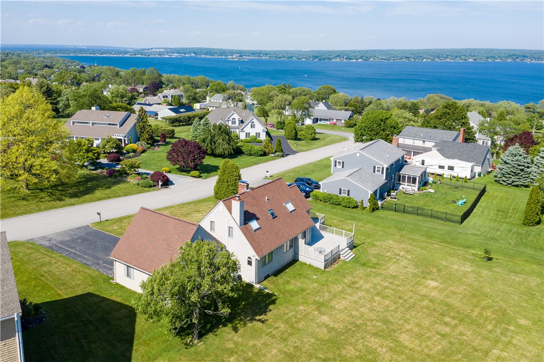 Desirable River Hylands location overlooking the Sakonnet River. Classic Shingle Cape with a Contemporary flair and bright sun filled rooms.
