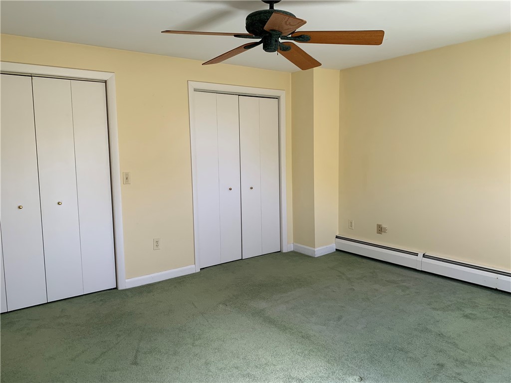 43 Lepes Road Portsmouth, RI 02871 - Photo 16 of 31 East bedroom with double closets and bathroom access. Currently used as master bedroom.
