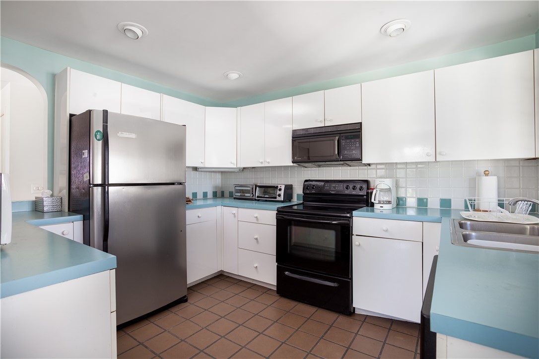 43 Lepes Road Portsmouth, RI 02871 - Photo 3 of 31 Kitchen offers nice counter area and white kitchen cabinets.