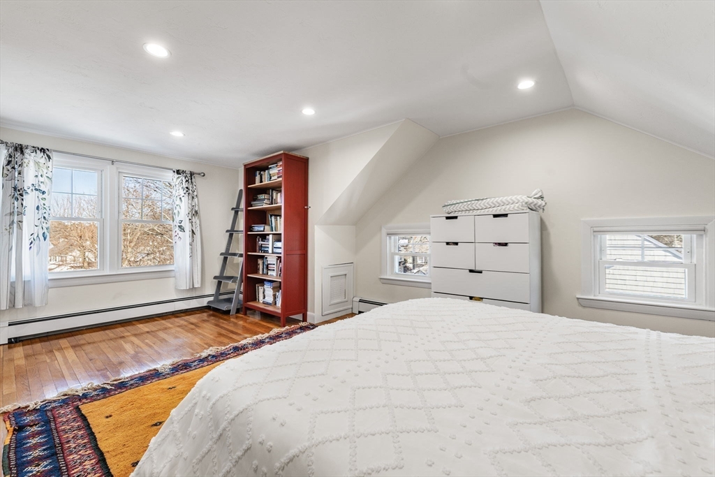 424 Brook Road Milton, MA 02186 - Photo 25 of 41 a bedroom with a large bed and a window