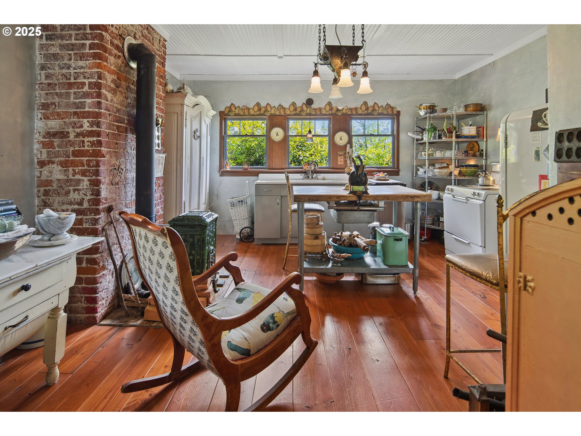 91755 Lewis And Clark Road Astoria, OR 97103 - Photo 18 of 48 a living room with furniture and a large window