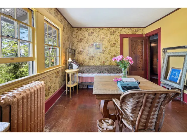 a outdoor dining space with furniture and window