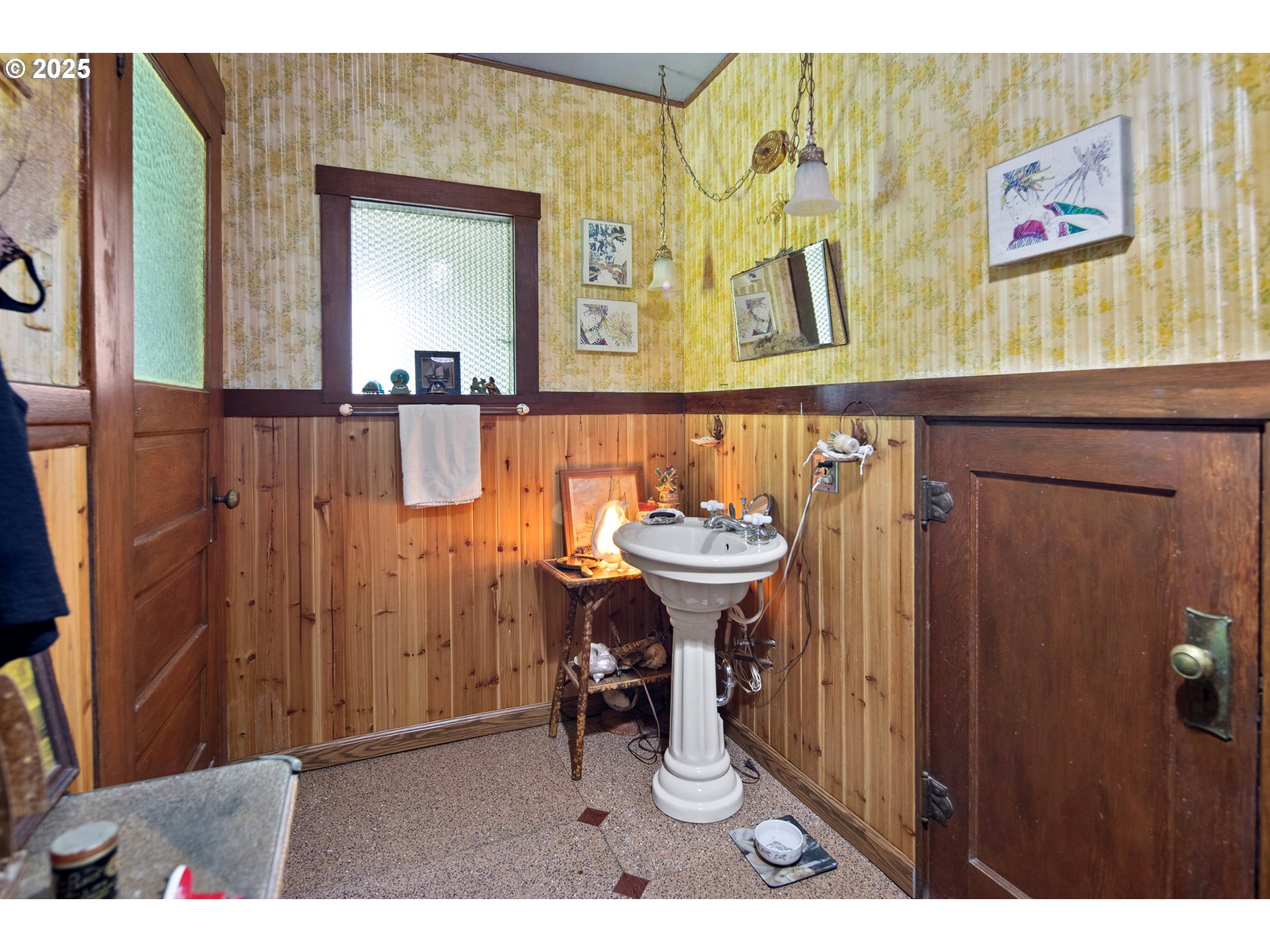 91755 Lewis And Clark Road Astoria, OR 97103 - Photo 29 of 48 a bathroom with a sink a mirror and a shower